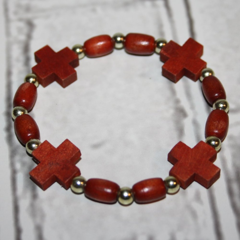 Beautiful gold and wooden cross beaded bracelet 7"
